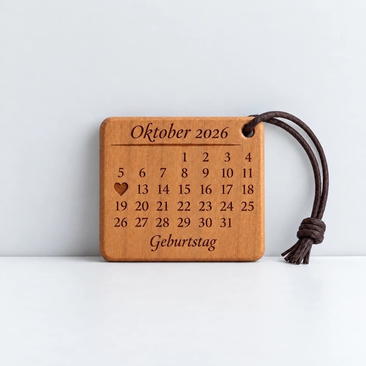 Kalender-Schlüsselanhänger mit gefülltem Herz zum Geburtstag – Produktansicht, Beispiel 12.10.2026