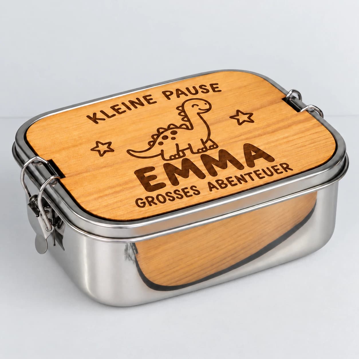 Personalisierte Edelstahl-Brotdose für Mädchen mit Dino-Gravur und dem Namen Emma auf Holzdeckel
